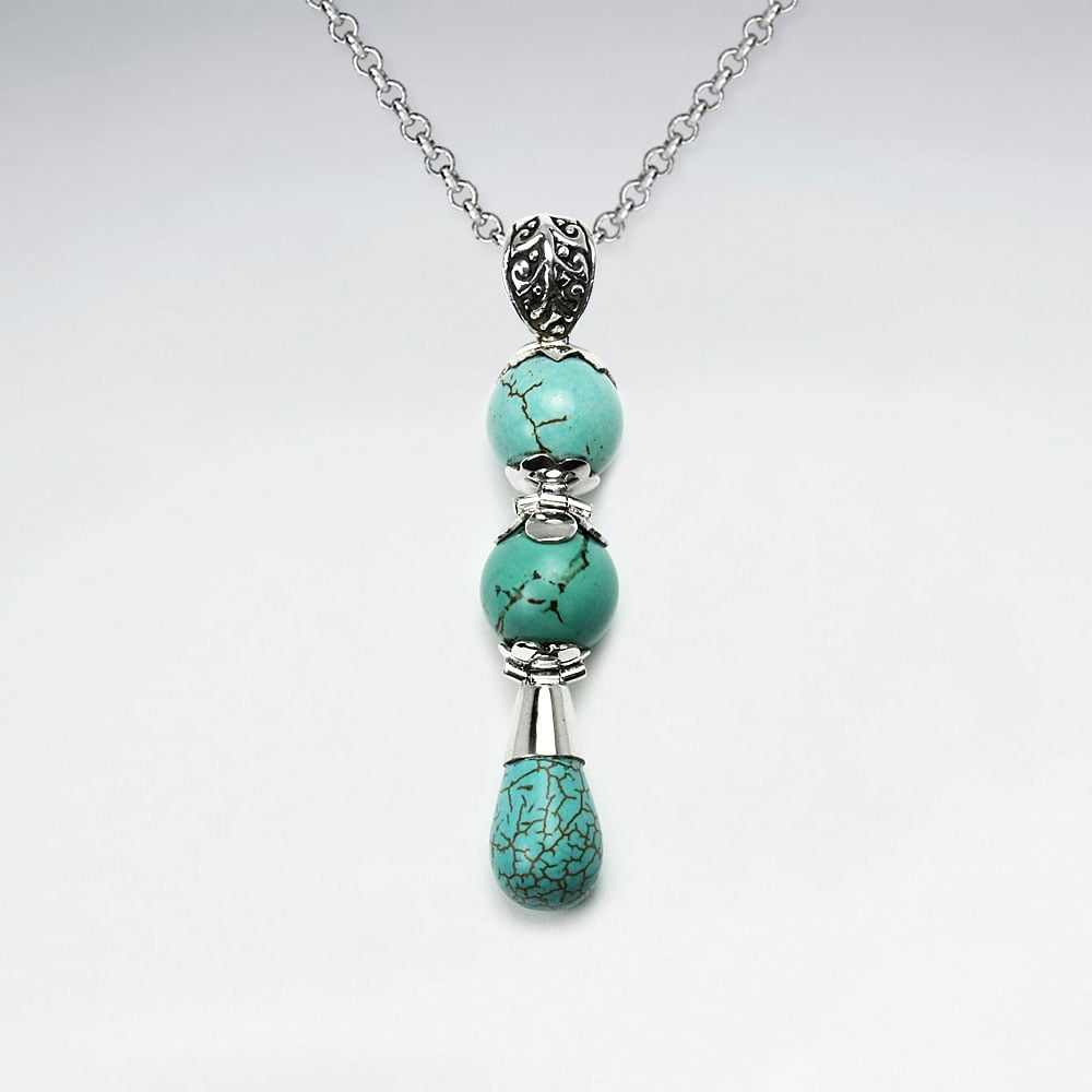 Turquoise and Silver Charms Cascade Dangle Pendant