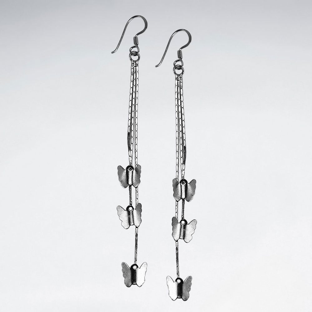 Delicate Butterfly Symphony Cascade Silver Silhouette Earrings